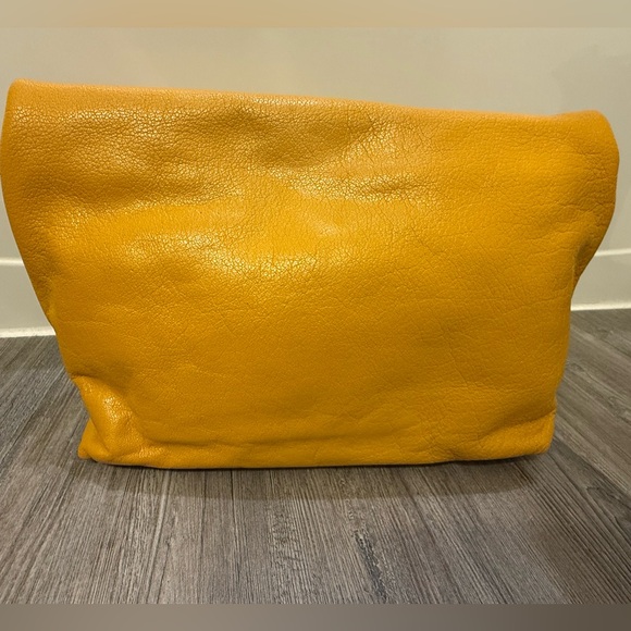 Dooney and Bourke Yellow Zippered Hobo Bag with Gold Embellishments - Picture 2 of 12